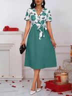 Robe Midi Fleurie Femme – Col V, Taille Nouée et Coupe Trapèze Élégante