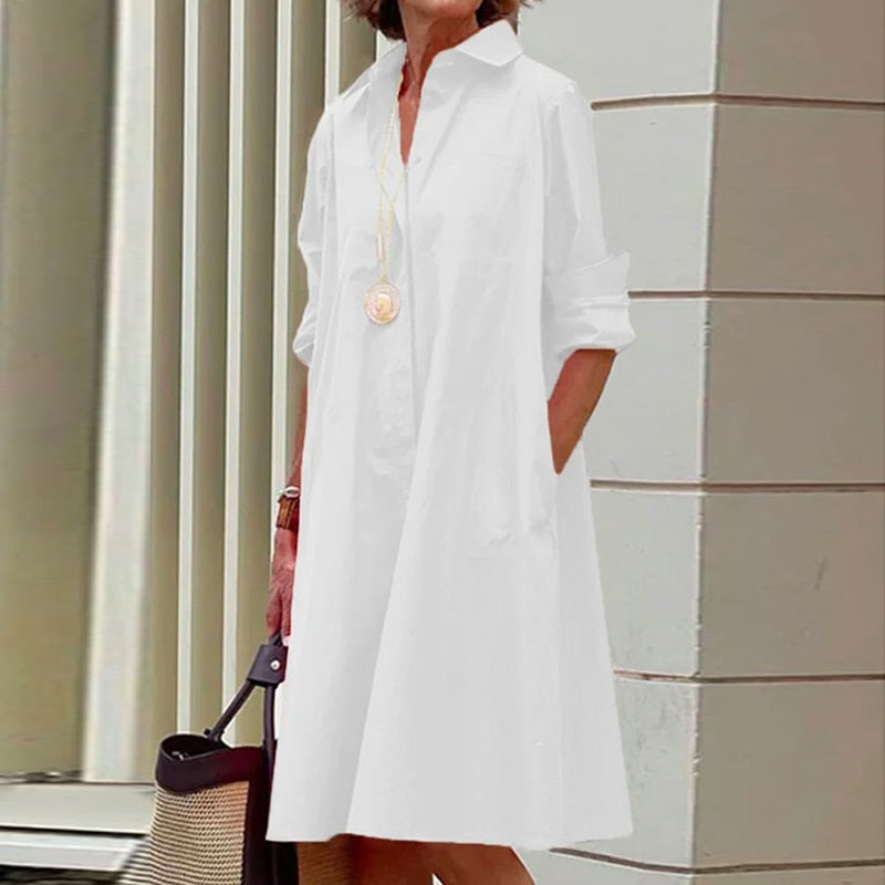Vestido camisero midi con cuello clásico y bolsillos - Colección 2024