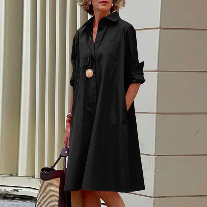 Vestido camisero midi con cuello clásico y bolsillos - Colección 2024